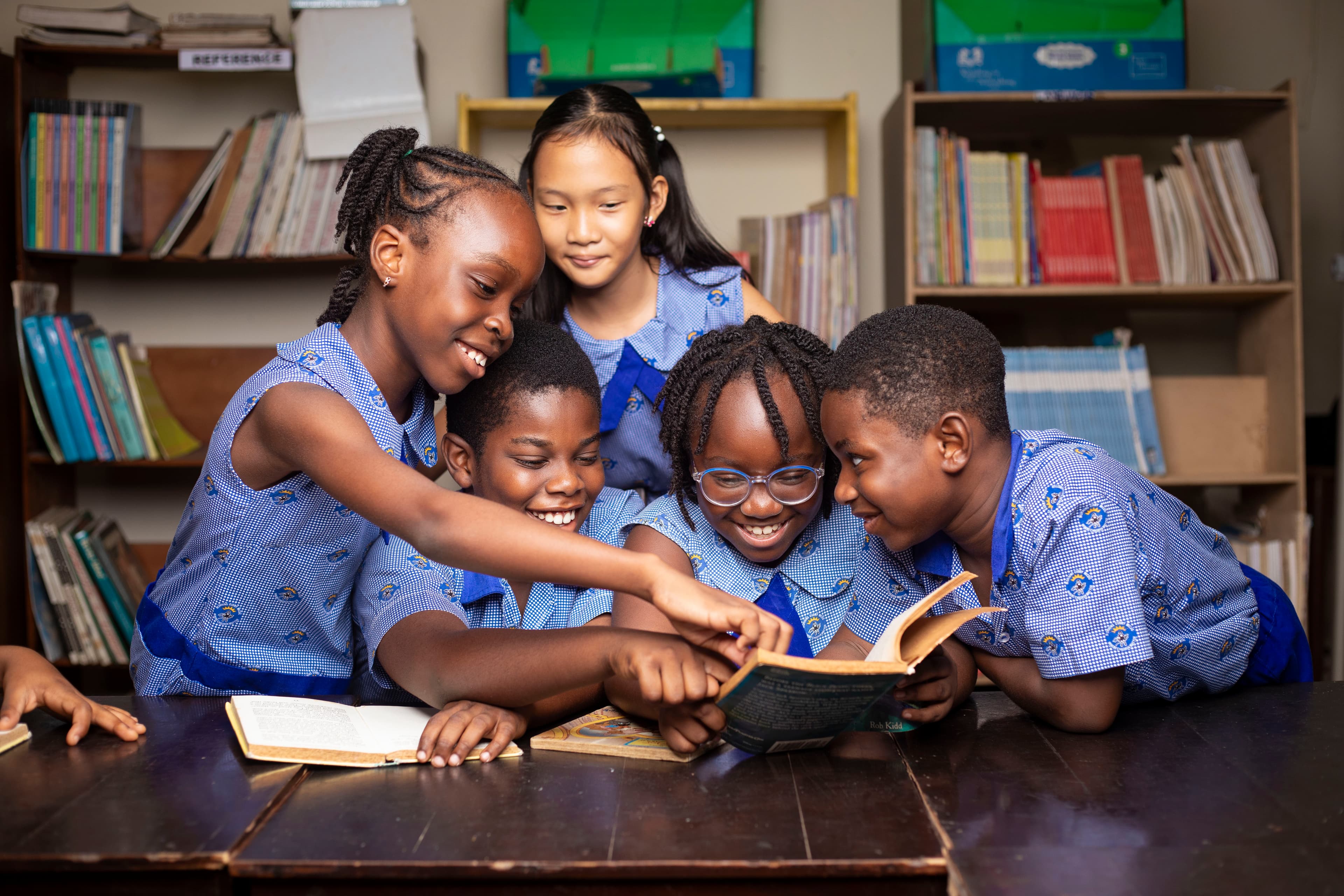 Happy children learning in a Montessori classroom